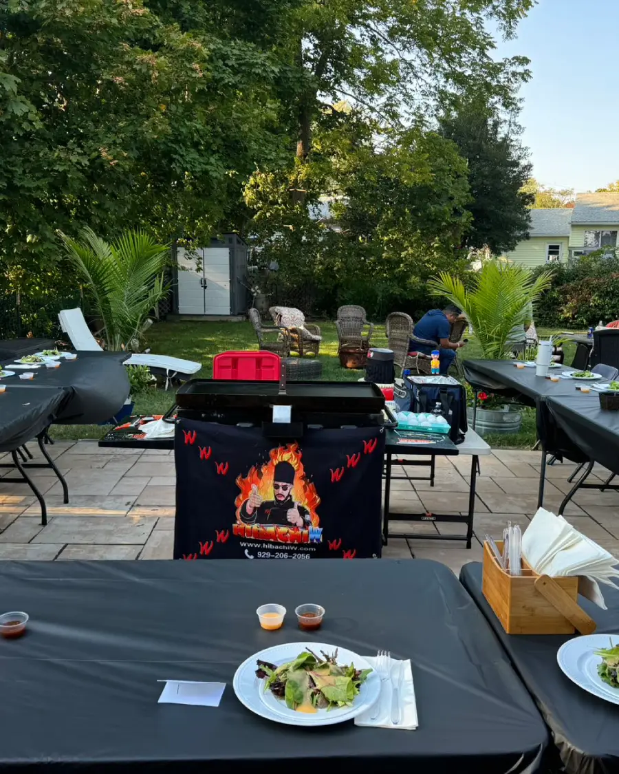 hibachi chef preparing a backyard dining setup at home in Florida