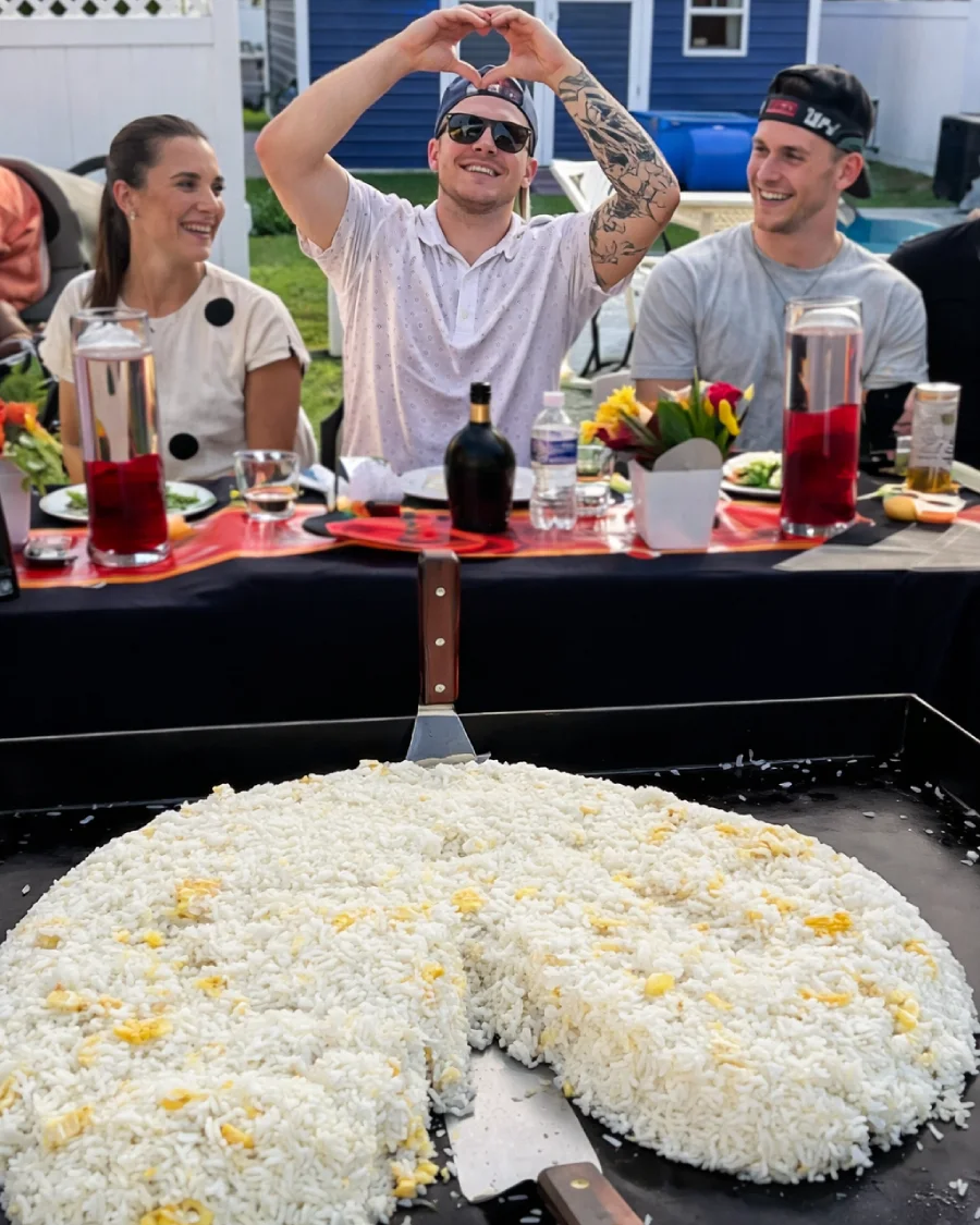 Private hibachi chef at home interacting with guests during a hibachi at home experience in Florida