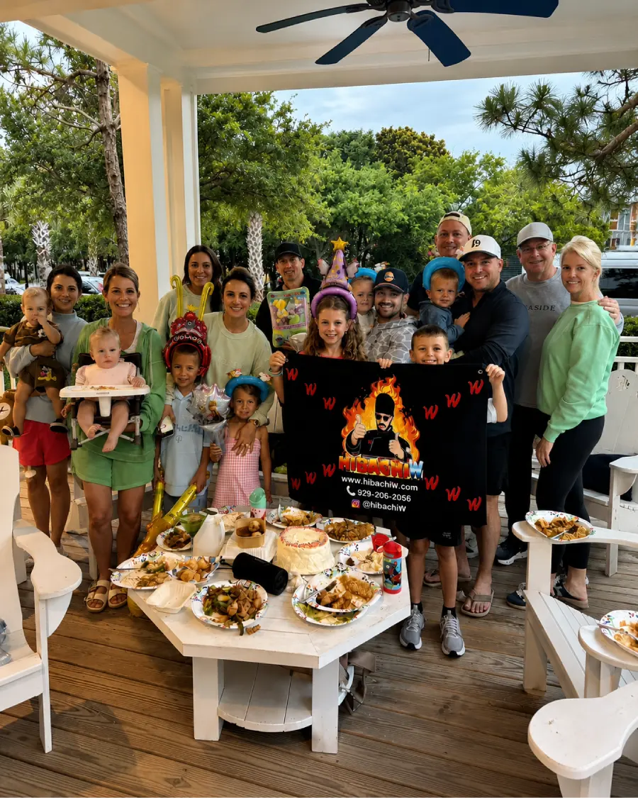 Family enjoying hibachi at home on a covered porch in Eastern Shore