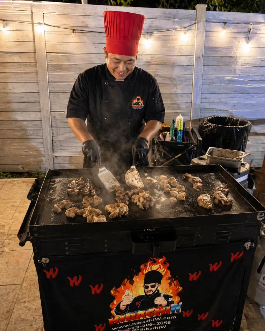 Private hibachi chef cooking in a backyard in Washington DC