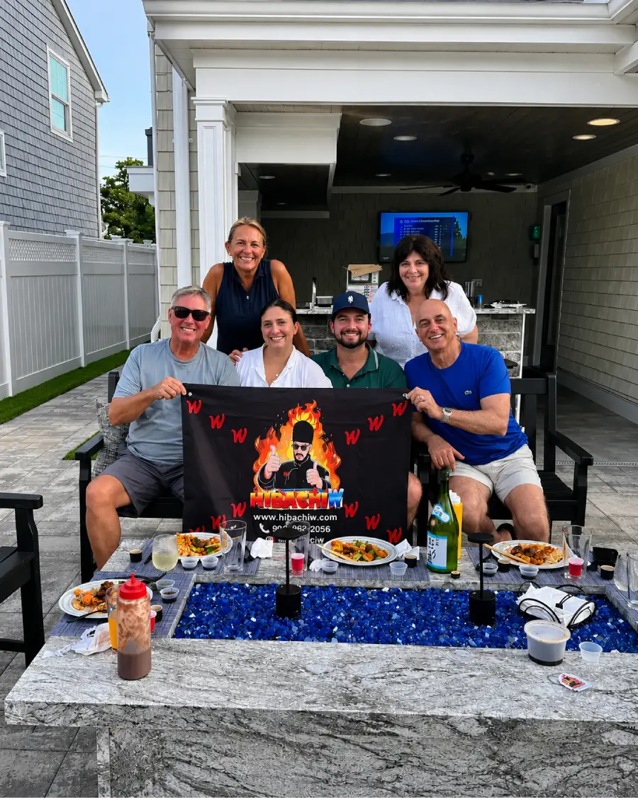 Family and guests enjoying a backyard hibachi at home experience in Washington DC
