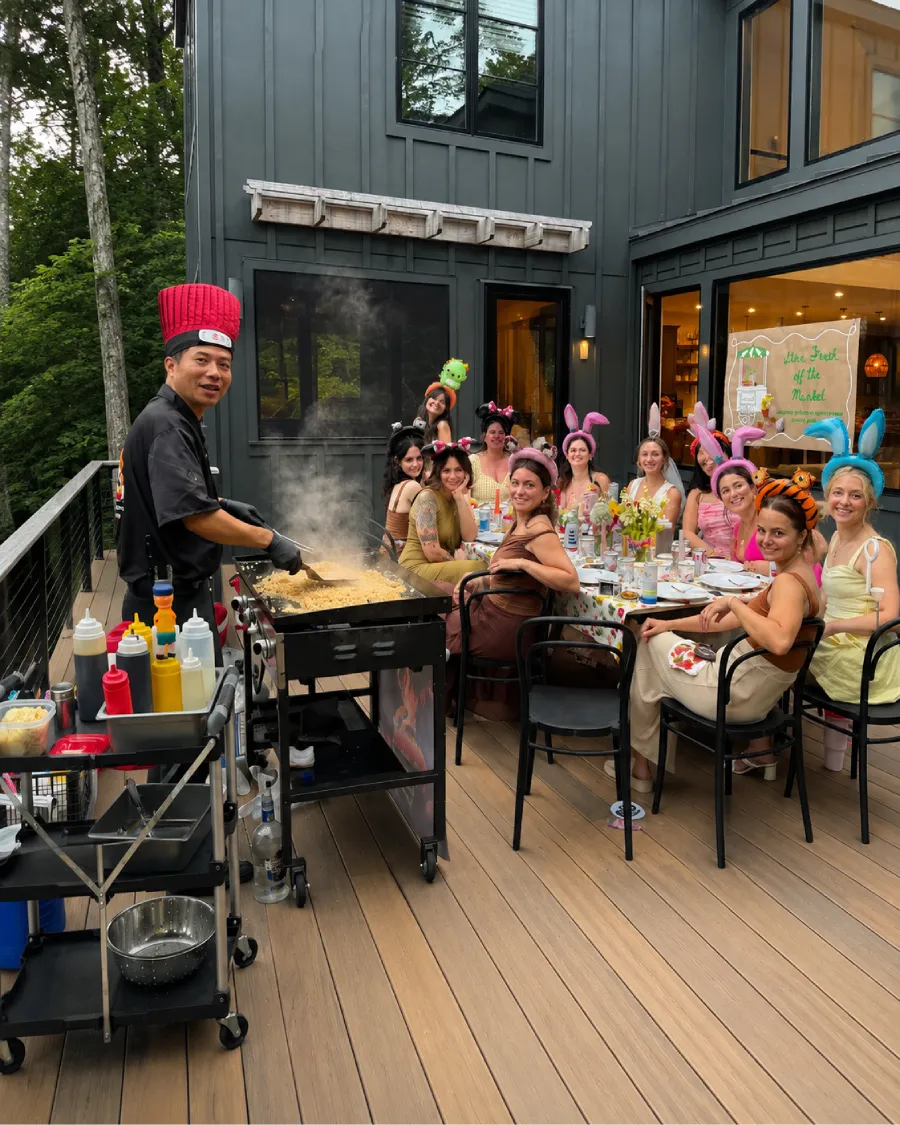 Private hibachi chef cooking live for guests at a backyard home in Edison, NJ