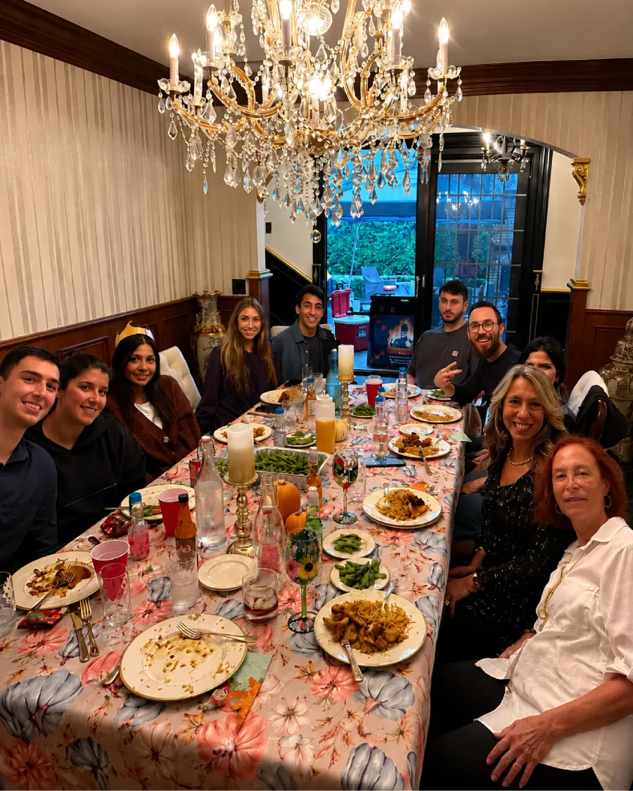 Family and guests enjoying a private hibachi at home dinner in Edison, NJ