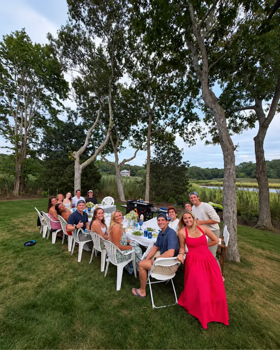 Guests enjoying hibachi at home dining near the water across Finger Lakes