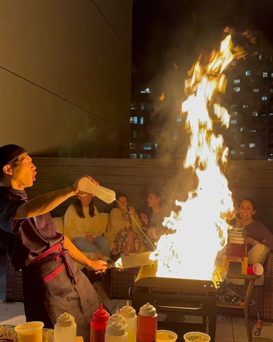 Private hibachi chef performing a fire show at a home in Baltimore Metro