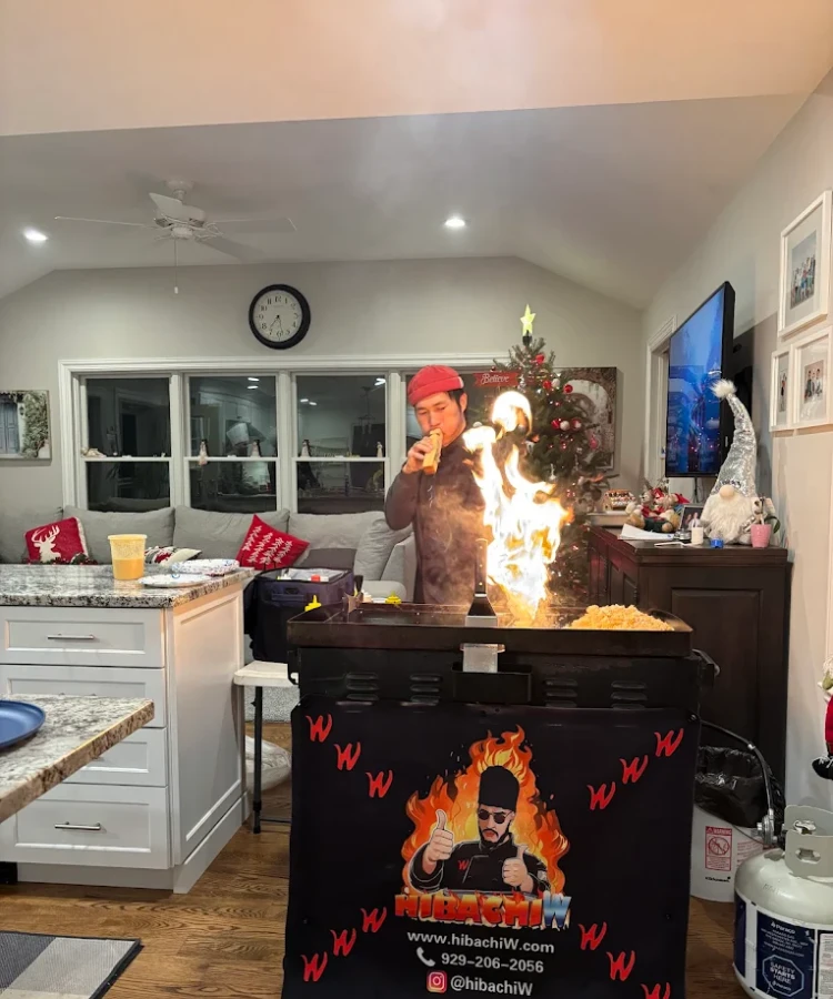 Private hibachi chef performing an indoor fire show in Baltimore Metro