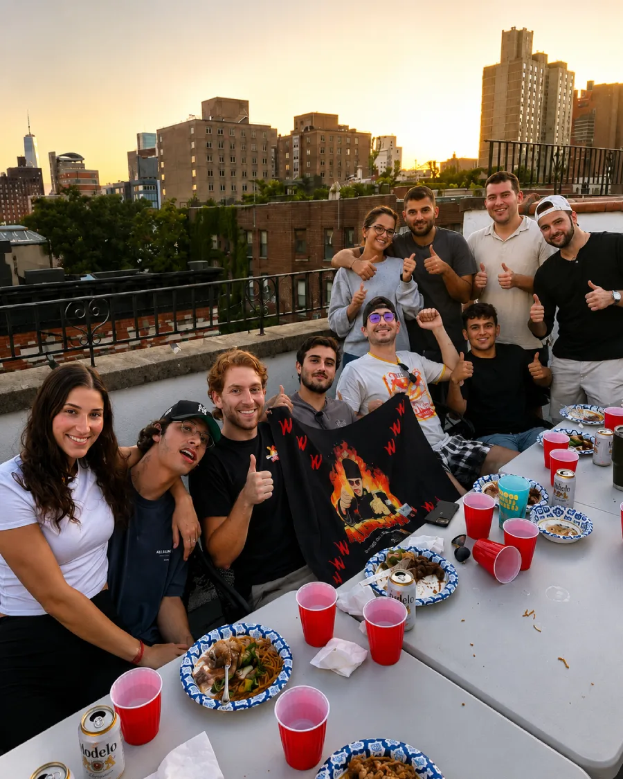 Guests enjoying hibachi at home dining on a private rooftop in Baltimore Metro