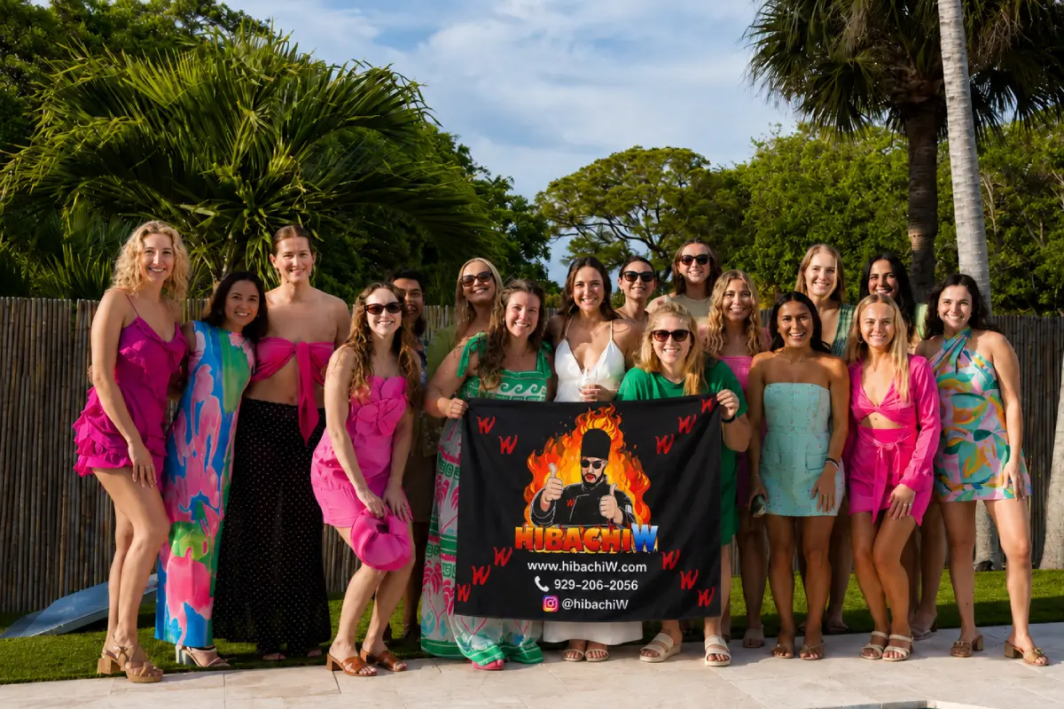 Guests celebrating at a poolside hibachi birthday party in Texas
