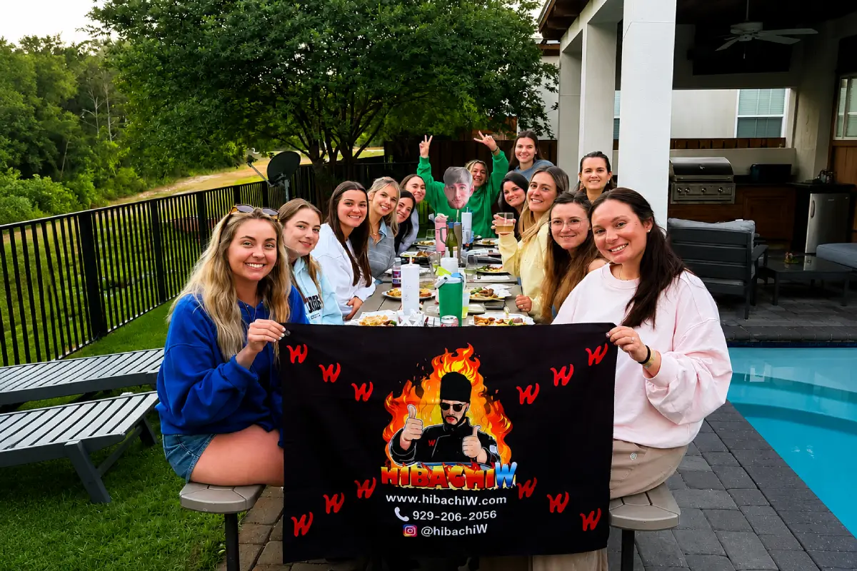 Private hibachi at home group dining experience beside a backyard pool