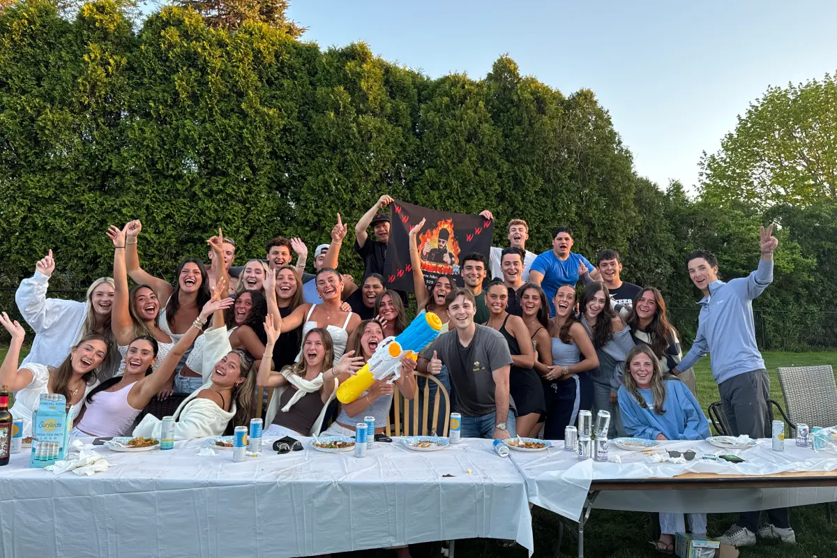Large group celebrating after a backyard hibachi party with a private hibachi chef