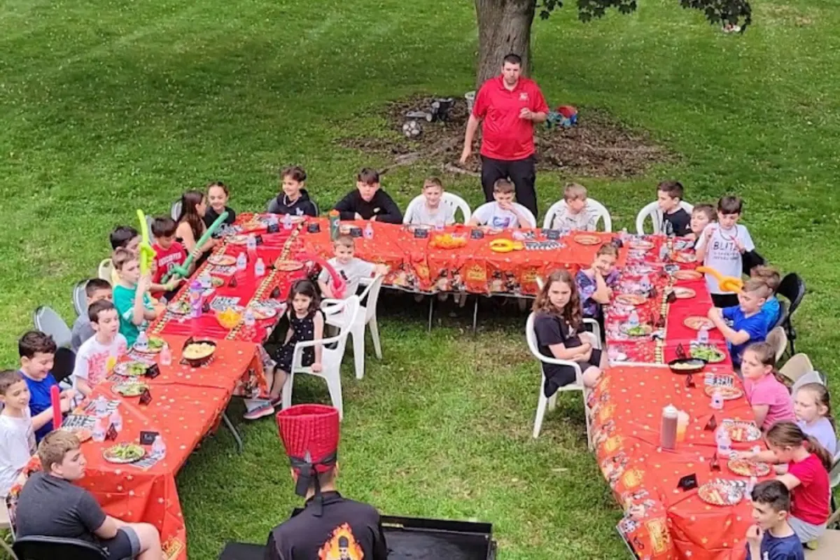 Kids hibachi birthday party with a private hibachi chef cooking for guests in New Jersey