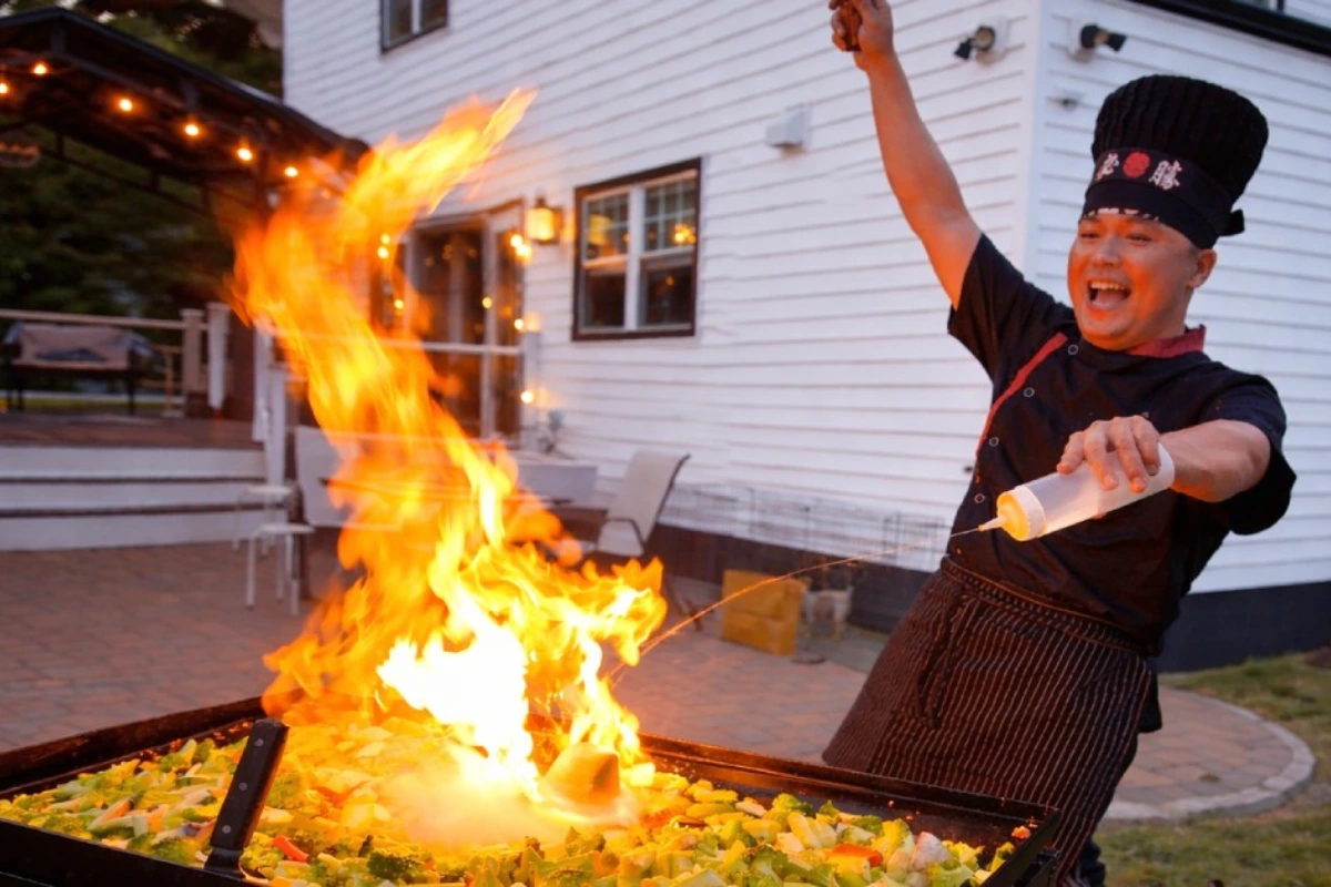Private hibachi chef cooking at home in a New Jersey backyard