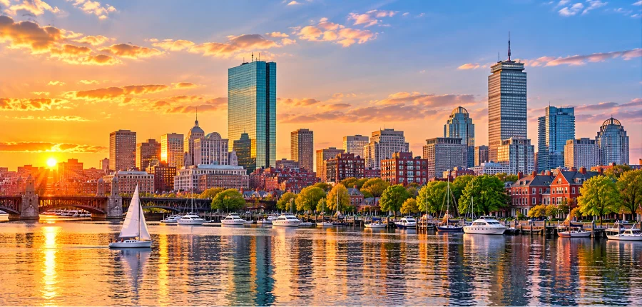 Boston skyline at sunset representing Hibachi W New England service areas